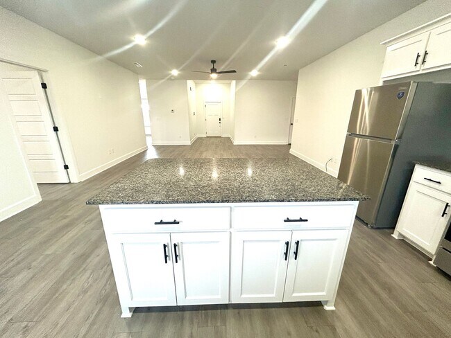 Building Photo - Centerton Home Available NOW! 4 bed, 2 full bath no carpet home. LARGE fenced backyard