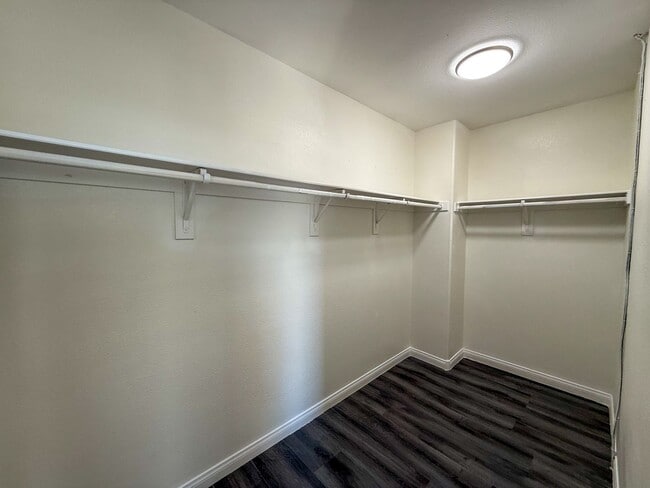 Building Photo - SPACIOUS HOME IN GATED COMMUNITY WITH POOL, RV PARKING & 4-CAR GARAGE!