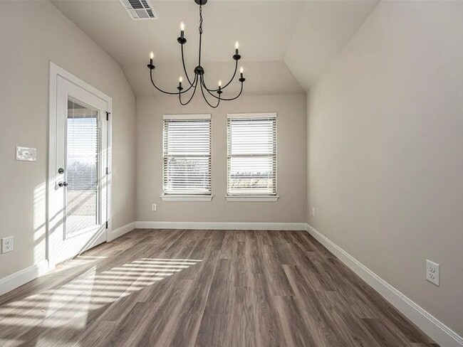 Building Photo - 4-Bed Home with Storm Shelter & 2-Car Garage in Mustang