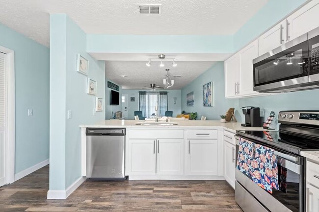 Building Photo - Fully Furnished Coastal Living in the Heart of Panama City Beach!