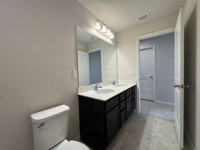 Building Photo - Ready Now: Panther Creek Two-Story Single Family Home