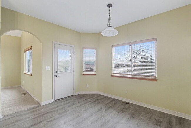 Building Photo - Spacious 5-Bedroom Home Backing to Open Space with Mountain Views