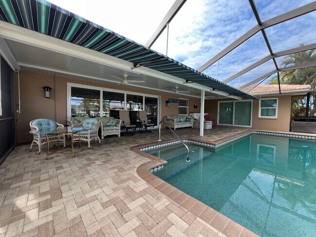 Building Photo - Furnished ** Punta Gorda Isles Vacation Home ** Heated Pool ** Canal / Boat Dock ** $7,500