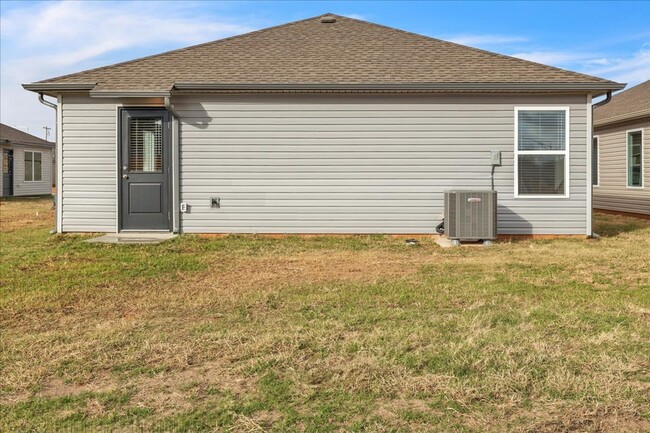 Building Photo - Brand New Yukon Home/Mustang schools