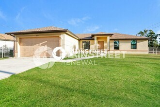 Building Photo - 4 Bedroom Pet-Friendly Home in Lehigh Acres, FL with Main Street Renewal