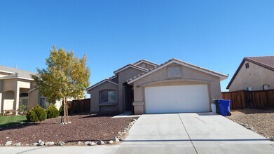 Building Photo - Adelanto Home-3 Bedrooms,2 Bathrooms, Laminate Floors, Indoor Laundry Room, Large Back Yard