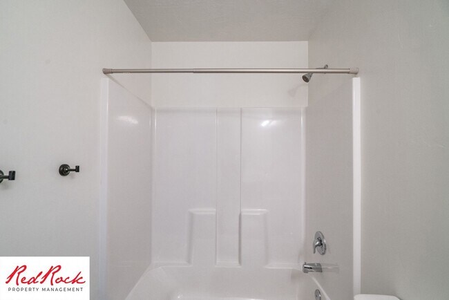 Building Photo - Stand Alone 4 Bedroom Corner Unit.