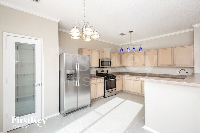 Building Photo - 4713 Palm Ridge Dr