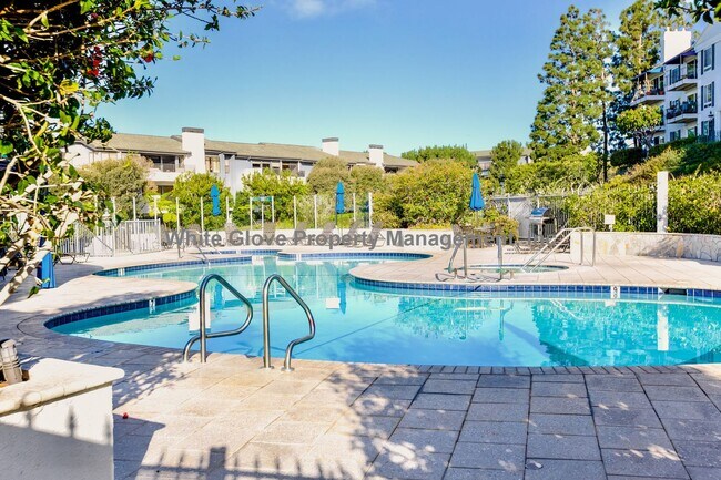 Building Photo - Updated Newport Beach Condo in Gated Versailles Community with Resort-Style Amenities