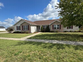 Building Photo - 4 Bedrooms, Big Yard & Top Schools – Don’t...