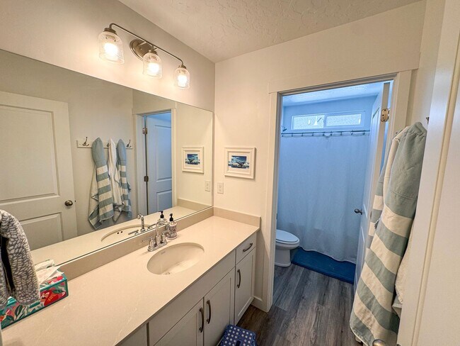 Building Photo - Modern 4 Bed / 3 Bath Home in Syracuse | Bonus Room + Fenced Yard + 86” TV Included