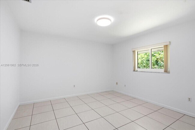 Building Photo - 12365 SW 60th Ct