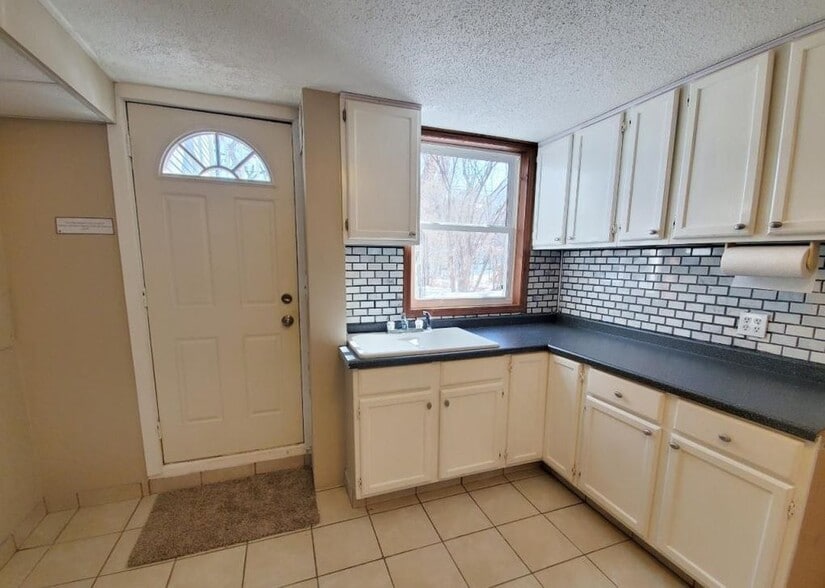 Kitchen Area Of Studio - 1651 Dakota Ave S