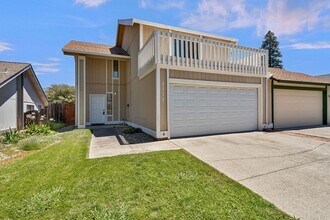 Building Photo - 3 Bedroom Home with Fireplace and LVP Flooring & 2-Car Garage!