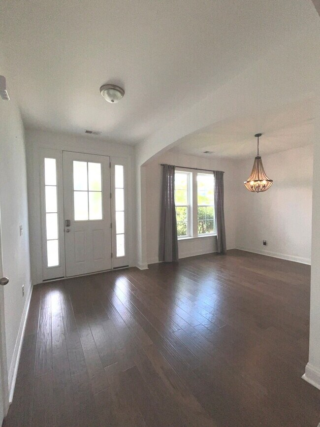 Building Photo - "Spacious 4-Bed Oasis with Stunning Lake V...