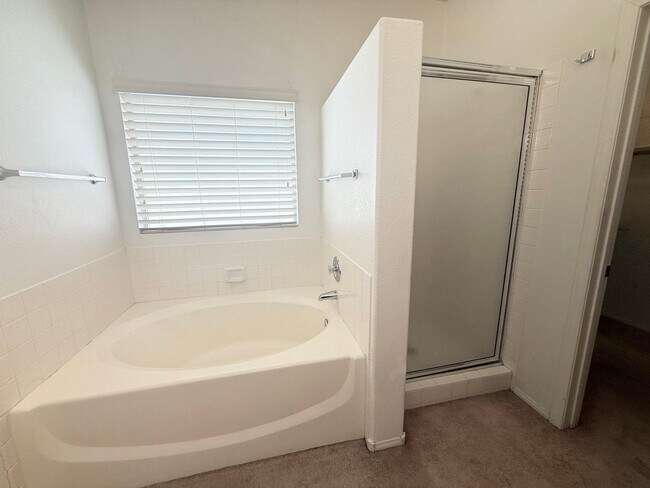 Building Photo - Spacious 4-Bedroom Home with 3-Car Garage in Orchards of Las Vegas