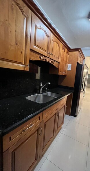 Granite countertops and stainless-steel appliances - 1560 NE 127th St