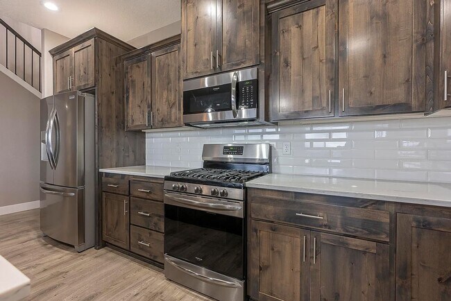 Building Photo - Modern 4BD/3BA Rental with Garage & Fenced...