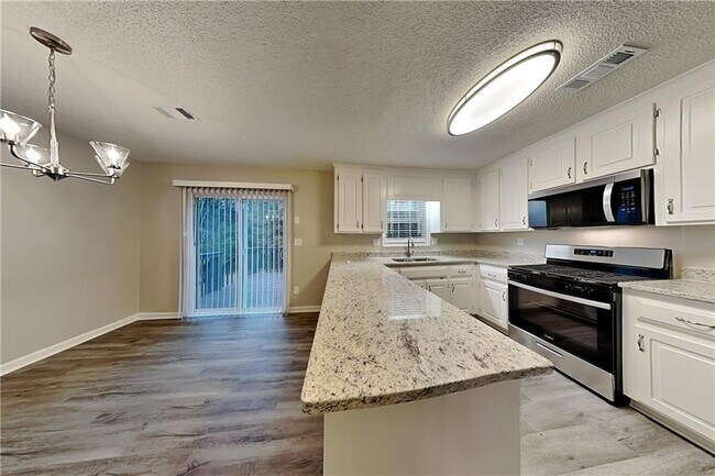 Building Photo - 4955 Baker Plantation Dr