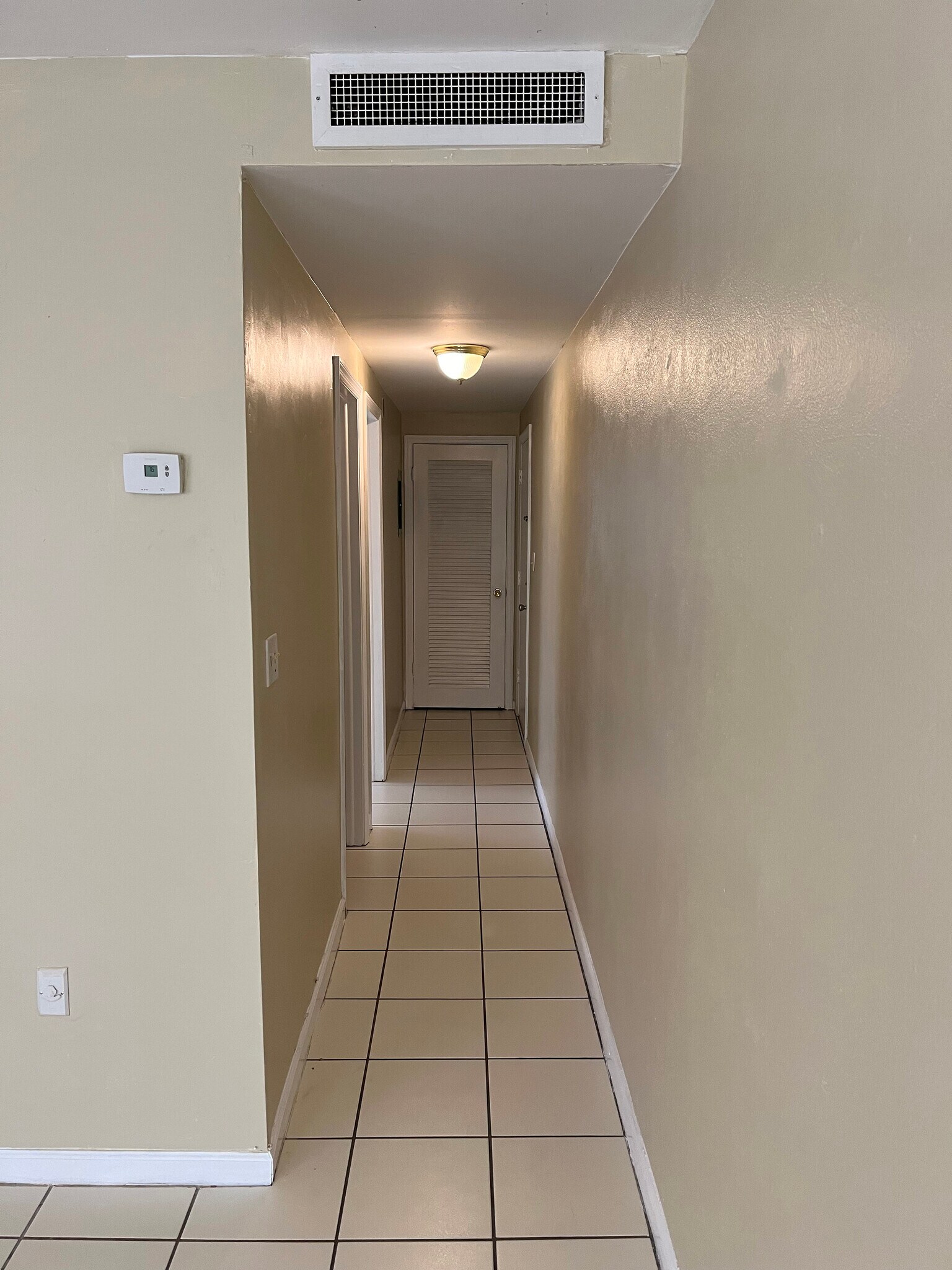 Hallway to bathroom, bedroom, and front entry door - 419 Ocean Ave