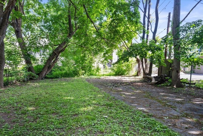 Building Photo - 4 Bedroom 2 Full Bath House | Front Porch ...