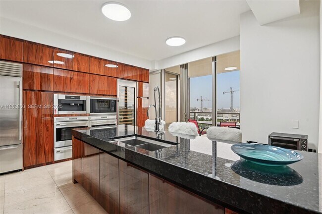 Building Photo - 9705 Collins Ave