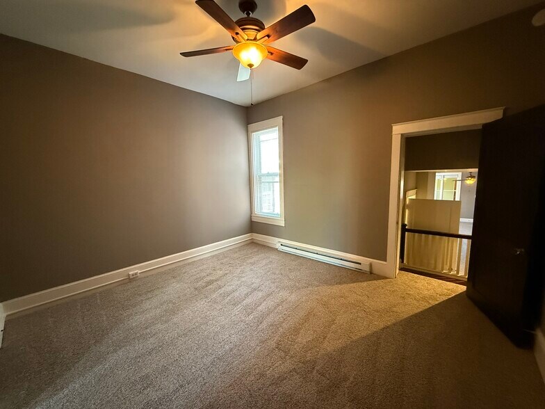 Bedroom 2 facing living room - 218 E Orange St