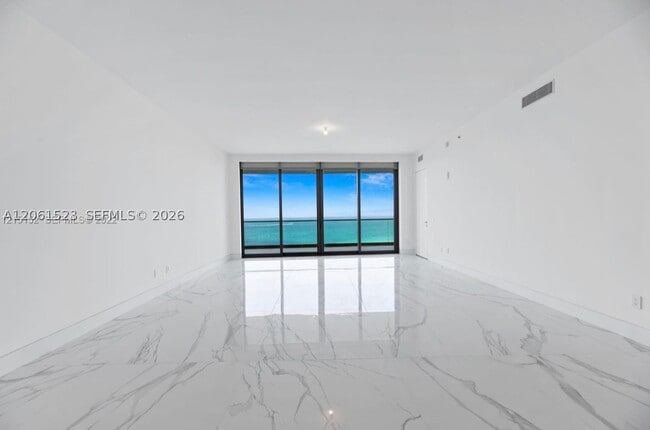 Building Photo - 18975 Collins Ave