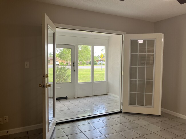 Living room opens to sun room - 835 Santa Isabel Blvd