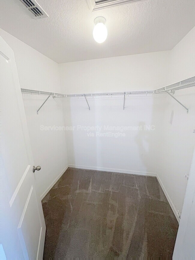 Building Photo - 7648 Ginger Lily Ct