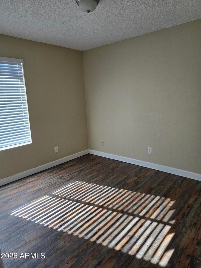 Building Photo - 9002 W Roma Ave