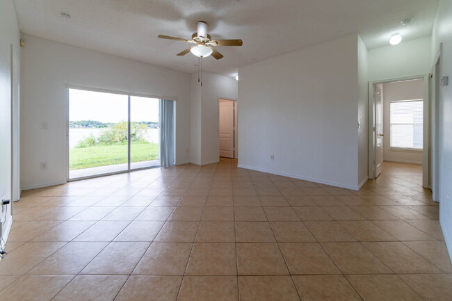 Building Photo - **Charming 4BR/2BA Pond-View Home with Boat Ramp Access – East Orlando **