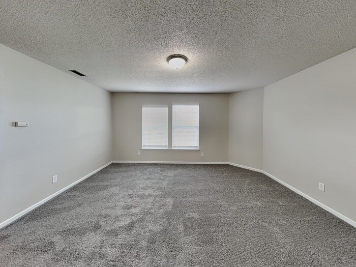 Building Photo - 9207 Wandflower Dr