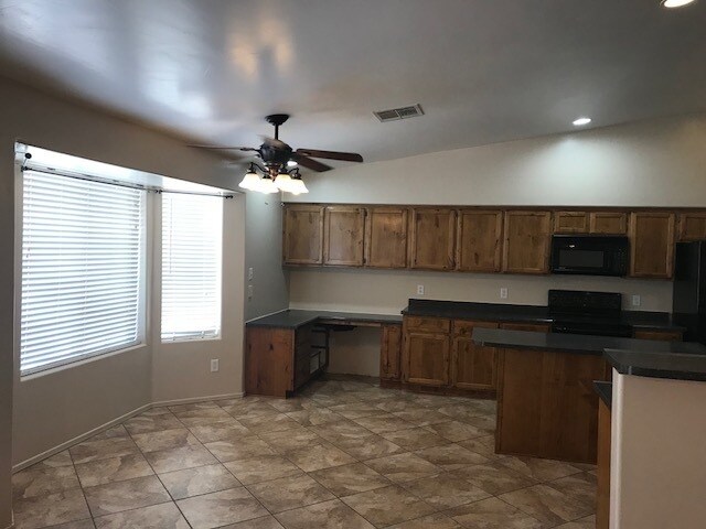 Building Photo - 4  BED, HUGE BACKYARD, 3 CAR GARAGE!