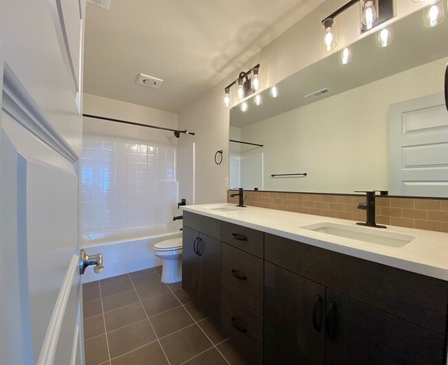 Building Photo - Stunning Southridge Rental with RV Garage ...