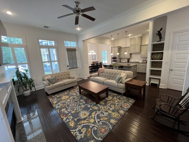 Building Photo - Luxury 4BR Home in Americana | 11 Ft Ceilings, Courtyard Living & Furnished Option at $3,950