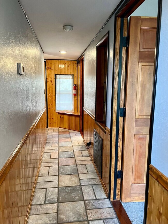 Building Photo - Cozy 3-Bed 2-Bath Cabin-Style Home Nestled...
