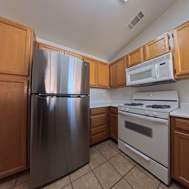 Building Photo - Upgraded 1 Bed 1 Bath Second-Story Condo at Opulence!