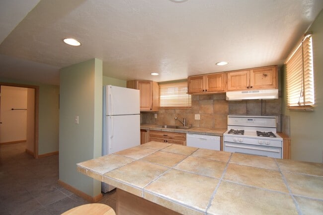 Building Photo - Amazing Home in Millcreek with Backyard Oasis!