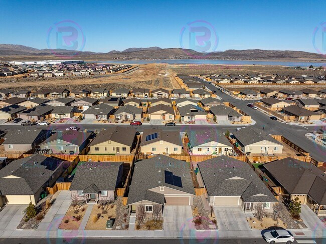 Building Photo - Spacious 4-Bedroom Lemon Valley Home with ...