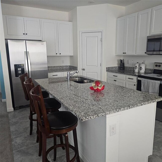 Building Photo - 299 Bottle Brush Dr