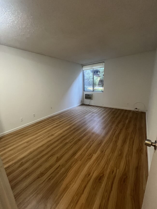 Spacious Bedroom with closet and wall A/C - 6435 Green Valley Cir