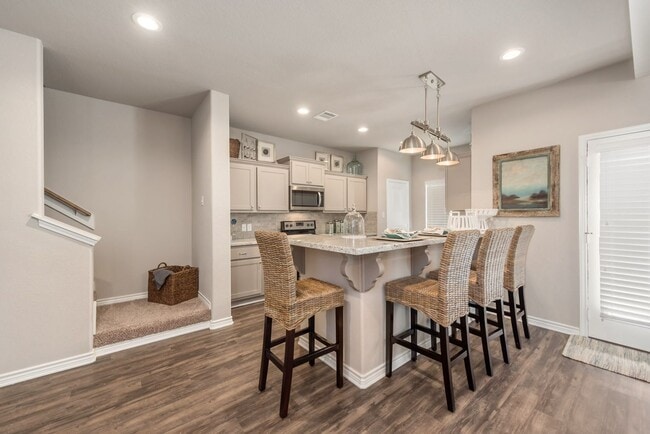 Building Photo - Now Pre-Leasing for August 2026! Well Appointed Townhomes with Fenced Backyards Close to Bus Stop...