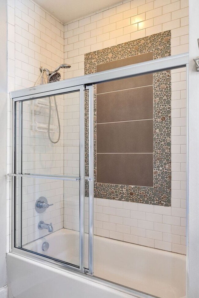 Building Photo - Welcome to this beautifully designed 4-bed...