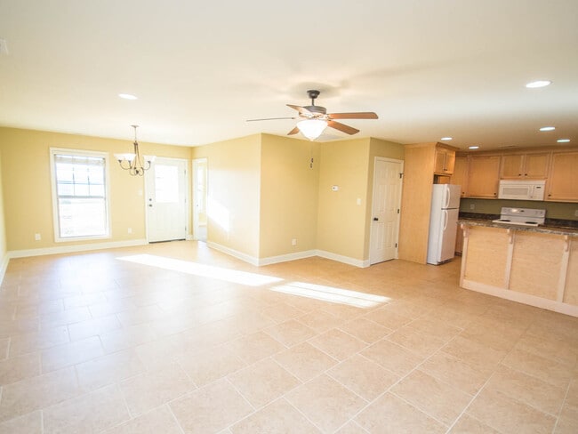 Building Photo - Minutes to Mazda Toyota and Amazon. Fenced back yard