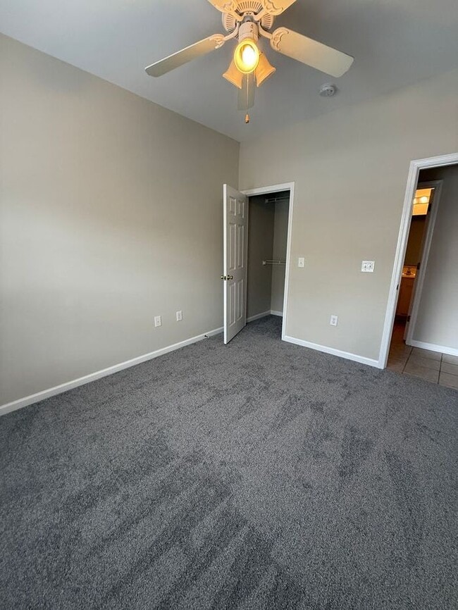 Building Photo - RENT SPECIAL! Freshly Painted! New Carpet!...