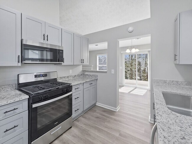 Building Photo - Charming Updated Ranch on Cul-de-Sac with Designer Finishes in Prime Kennesaw Location