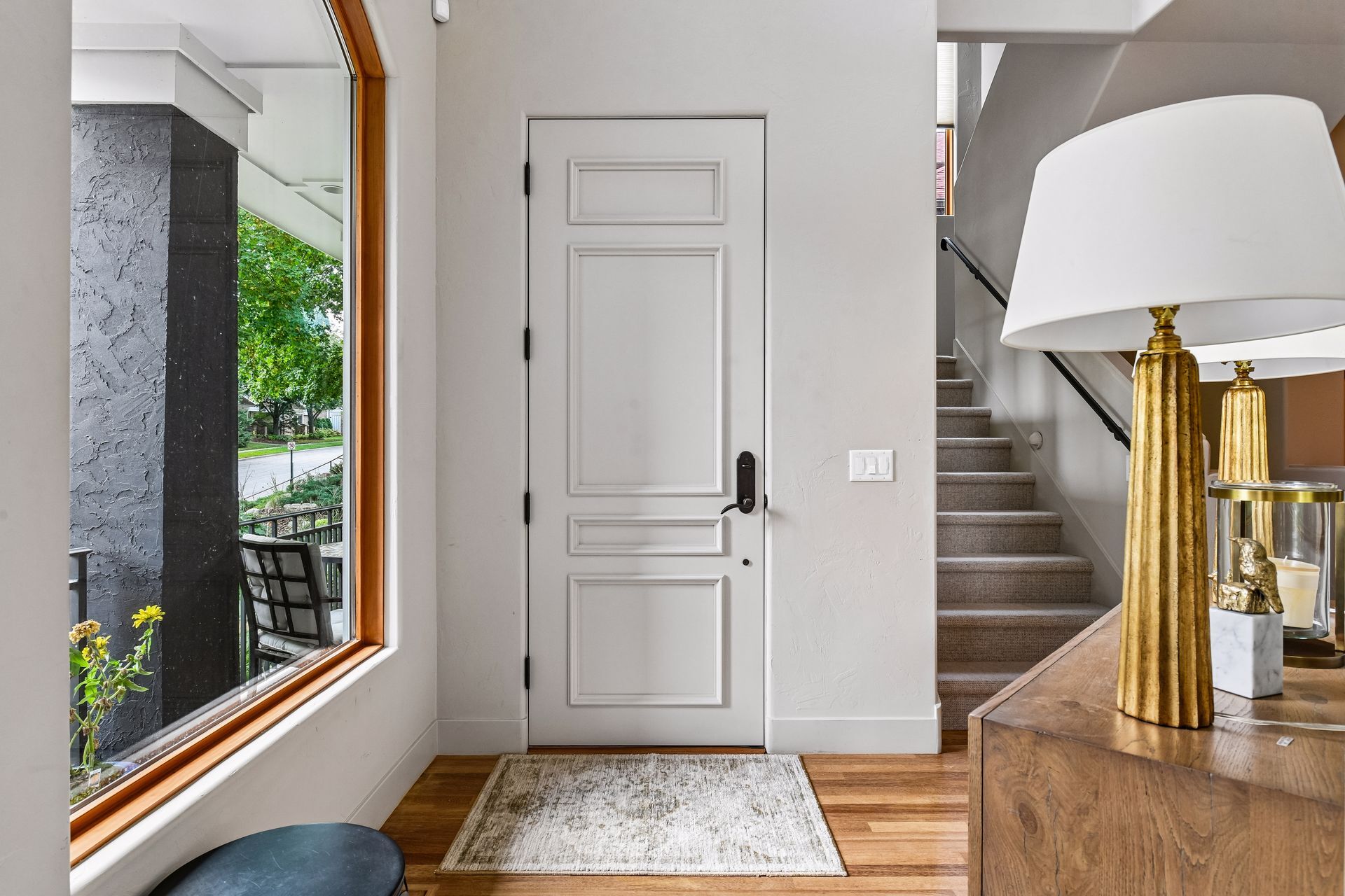 Step into this lovely entryway with soaring ceilings and an inviting main level - 745 Rice St E