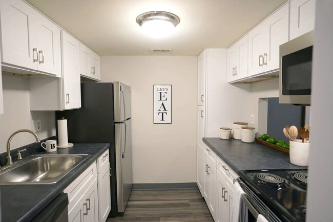Renovated kitchen with stainless steel appliances - Stonecliffe