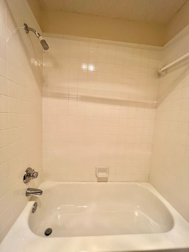 Building Photo - Available now! 3/2/2 with fenced backyard and small sunroom